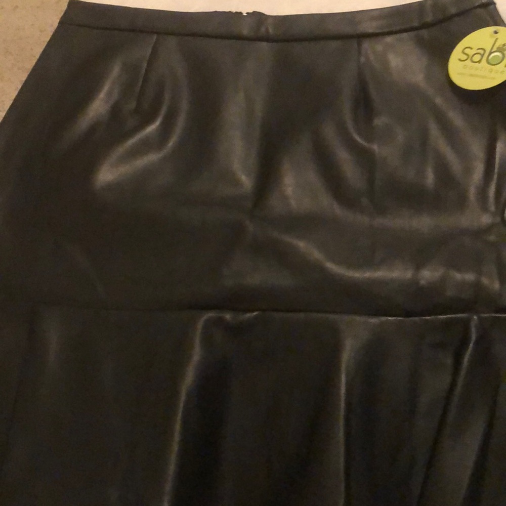 Faux leather zippered skirt.